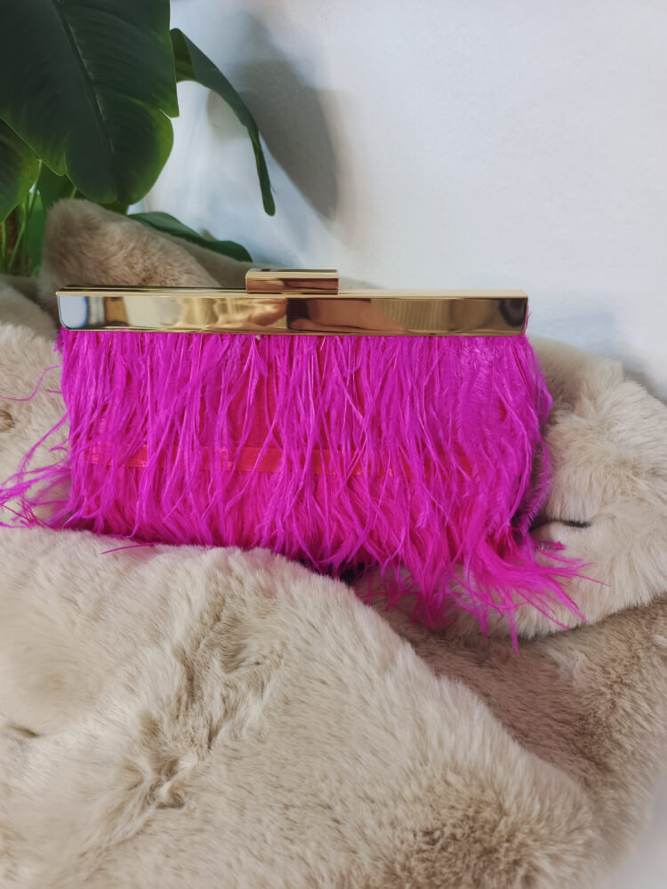 Bolso fucsia con flecos